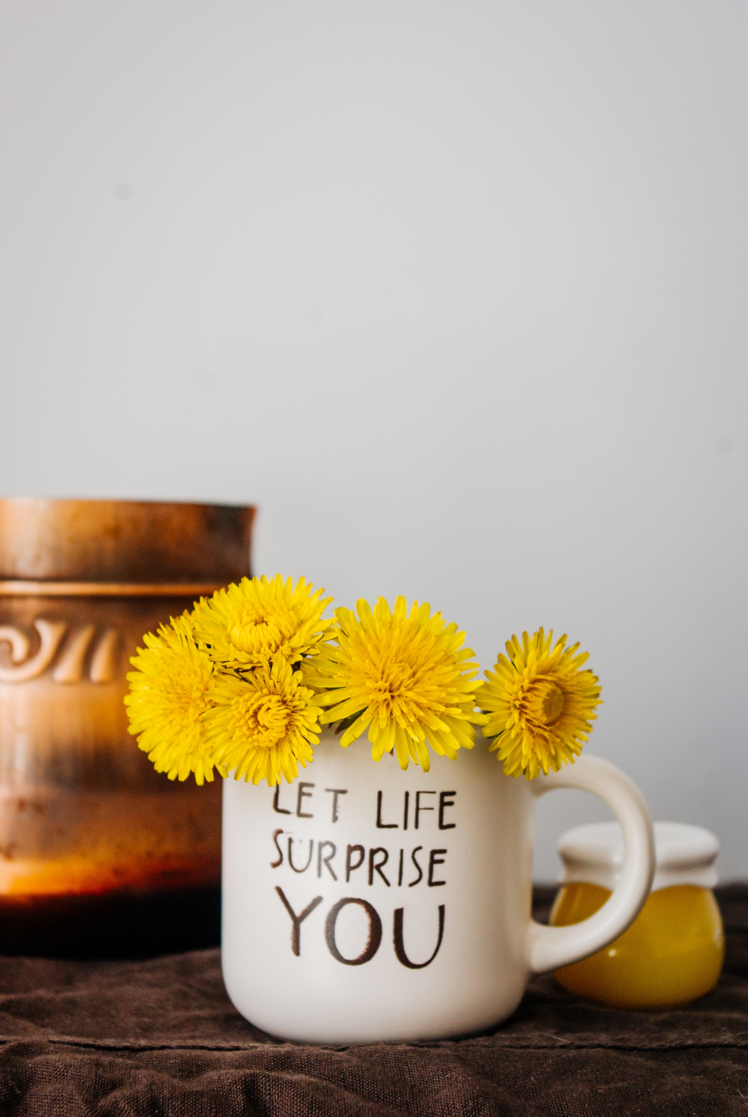 coffee-mug-with-yellow-flowers-let-life-surprise-you